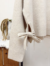Load image into Gallery viewer, Split Hem Side Tie Sweater